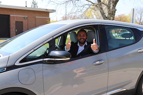 Driver with thumbs up
