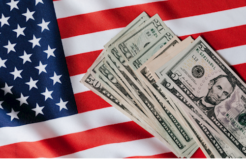 Photo of American flag and cash money 