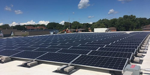 Solar photo voltaic panels installed on the roof of the Dane County Job Center